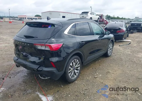 2021 Ford Escape Titanium Hybrid from USA, damaged, VIN 1FMCU0DZ0MUA16798